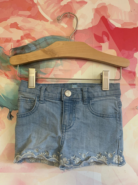 Baby Gap blue Jean shorts with white embroidery at hem. Size 12-18m