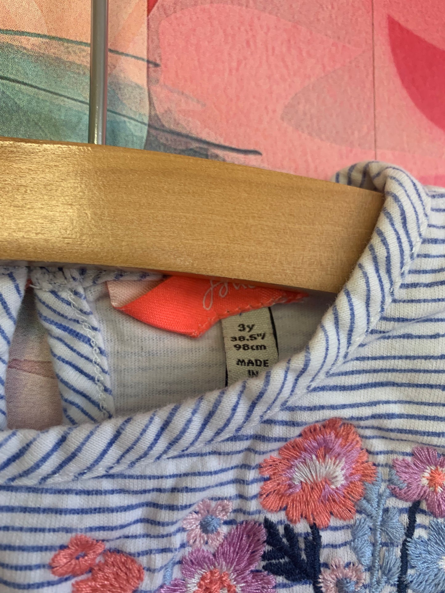 Joules blue & white stripe tshirt with embroidery flowers over pocket. Size 3T