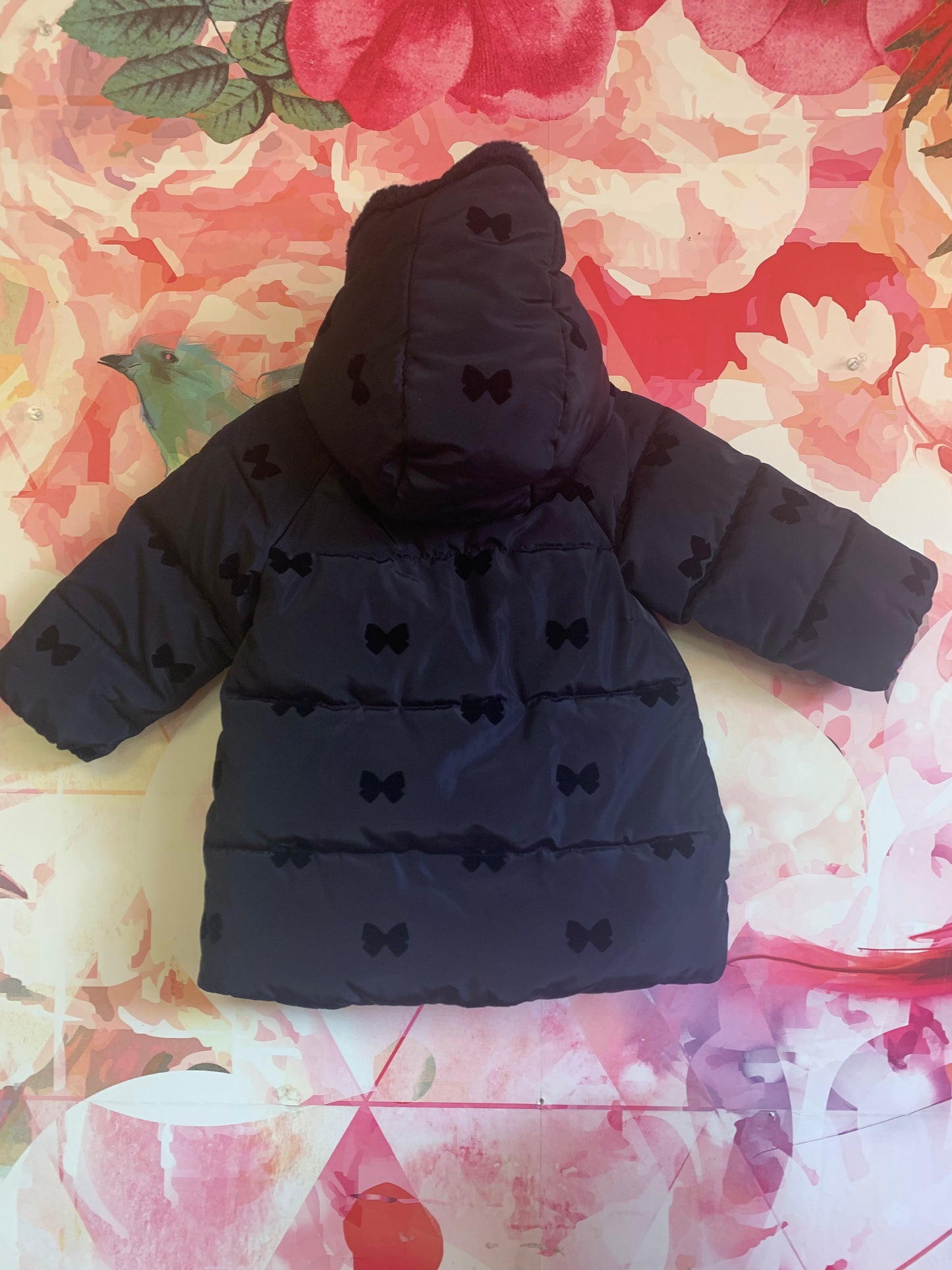 Jacadi Paris navy blue puffy coat with hood and velvet bow detail. Zipper and snap closure. Size 18m