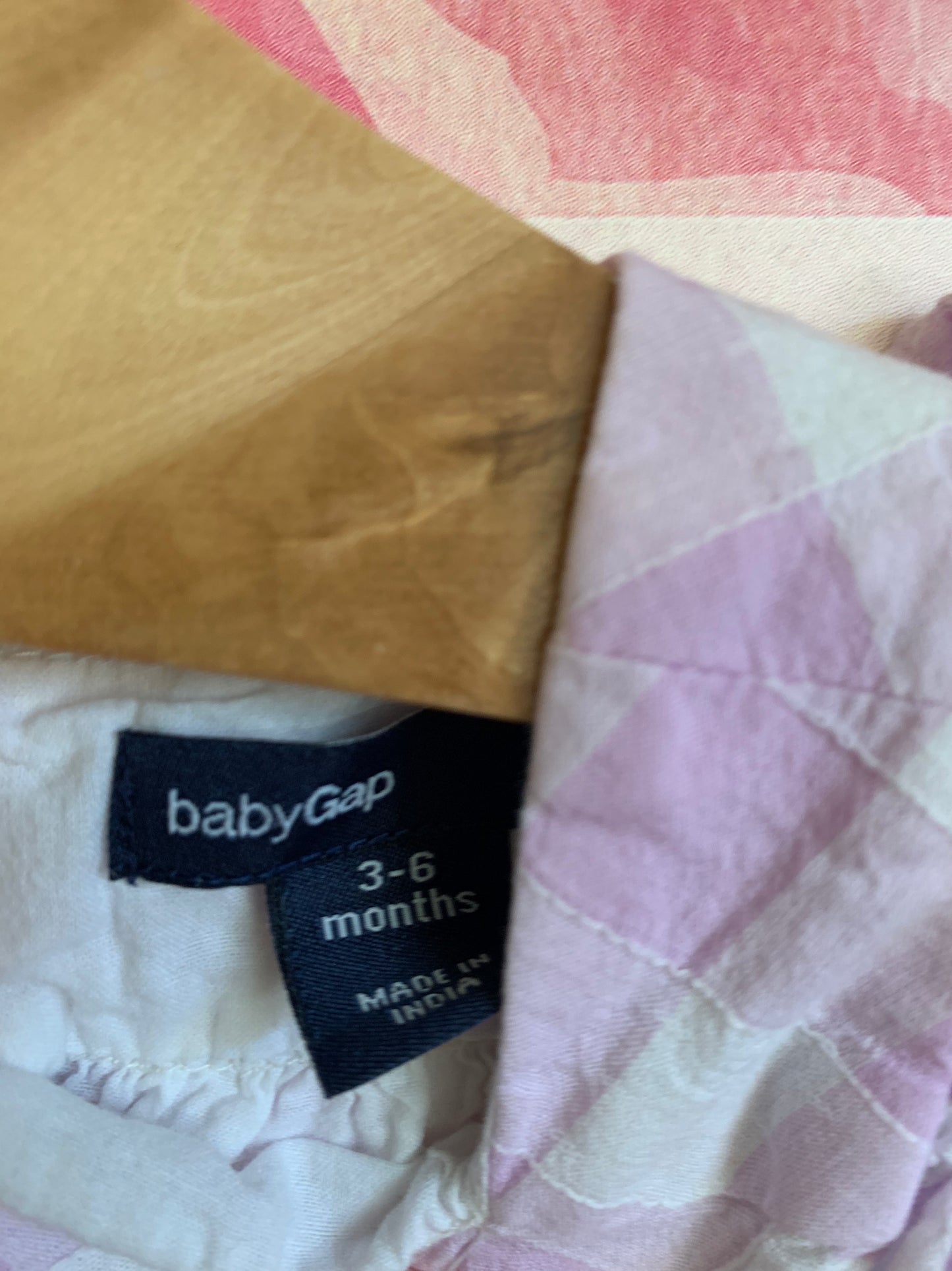 Baby Gap summer rompers. Peach with eyelet stitching on top and purple/white checkers. Both size 3-6m
