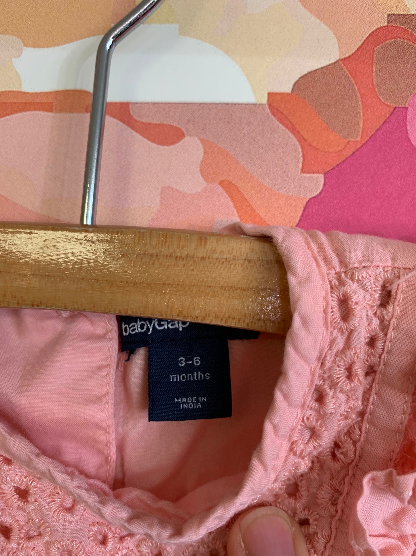 Baby Gap summer rompers. Peach with eyelet stitching on top and purple/white checkers. Both size 3-6m
