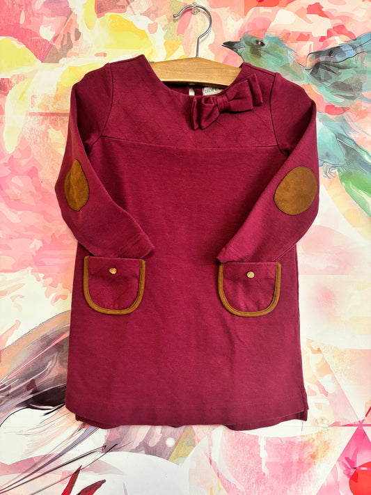 Hope & Henry burgundy dress with quilting on top, bow at neck, two front pockets and brown suede elbow pads. Size 3T.