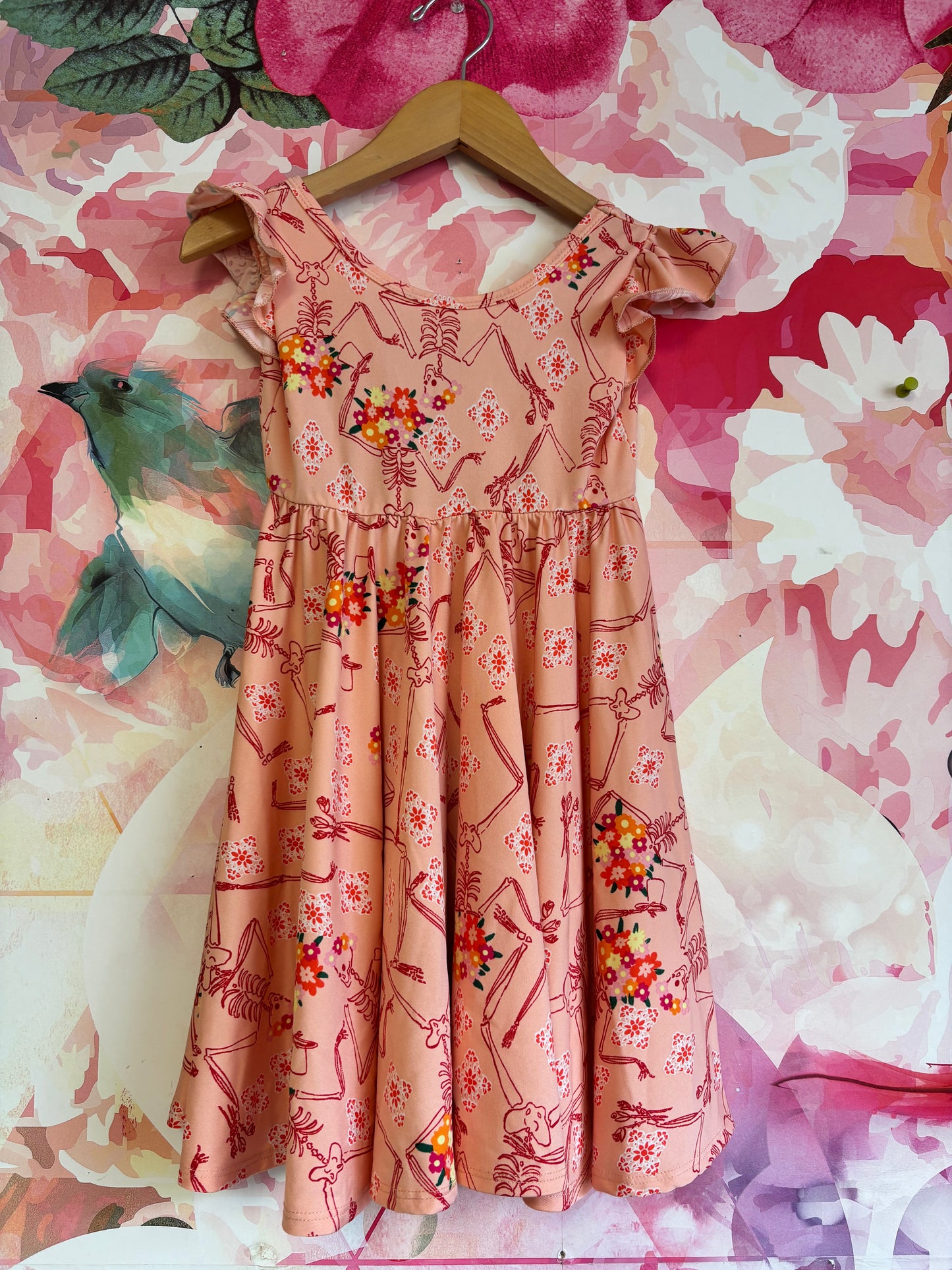 Dot Dot Smile orange flutter sleeve Halloween dress with skeletons and flowers. Size 3T / 4T