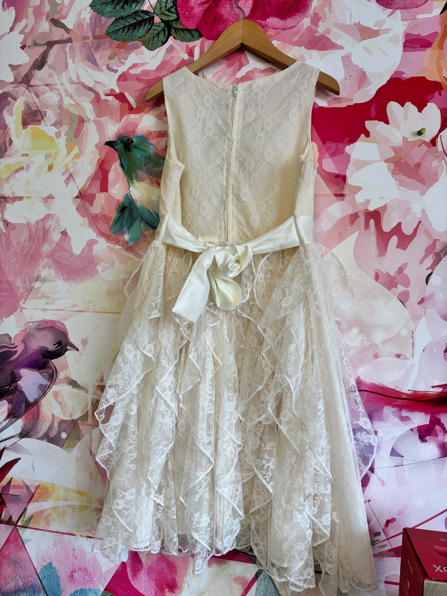 Mia Juliana cream lace sleeveless dress with waist bow. Size 16T.