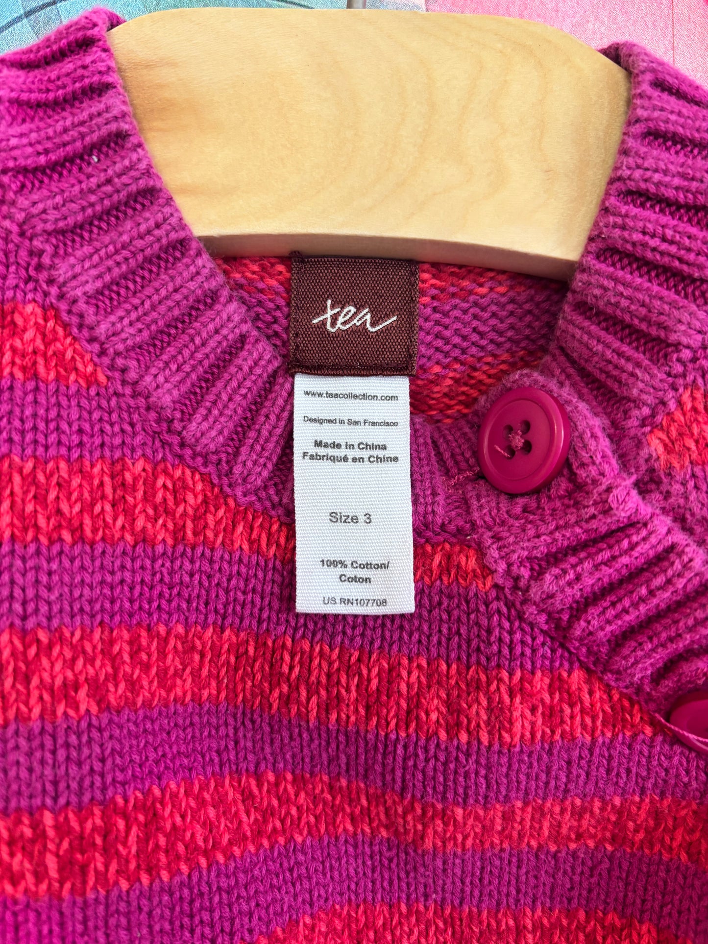 Tea Collection purple & red stripe sweater with diagonal shoulder buttons. Size 3T