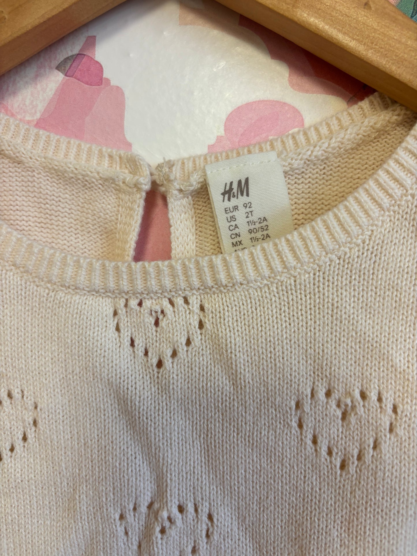 2 H&M rompers. Cream knit sleeveless with hearts and scalloped hem. Light blue denim adjustable overalls. Both size 2T