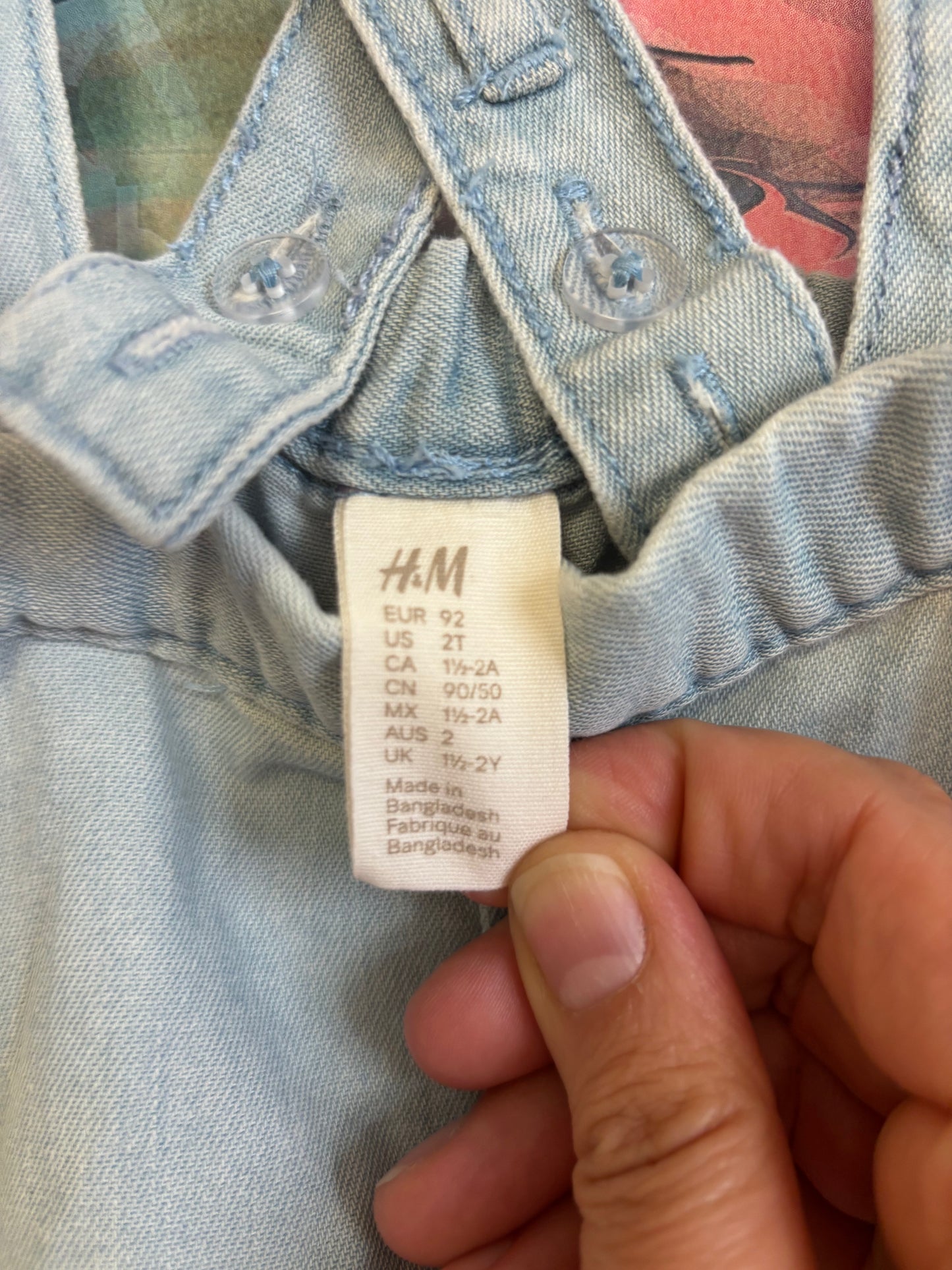 2 H&M rompers. Cream knit sleeveless with hearts and scalloped hem. Light blue denim adjustable overalls. Both size 2T