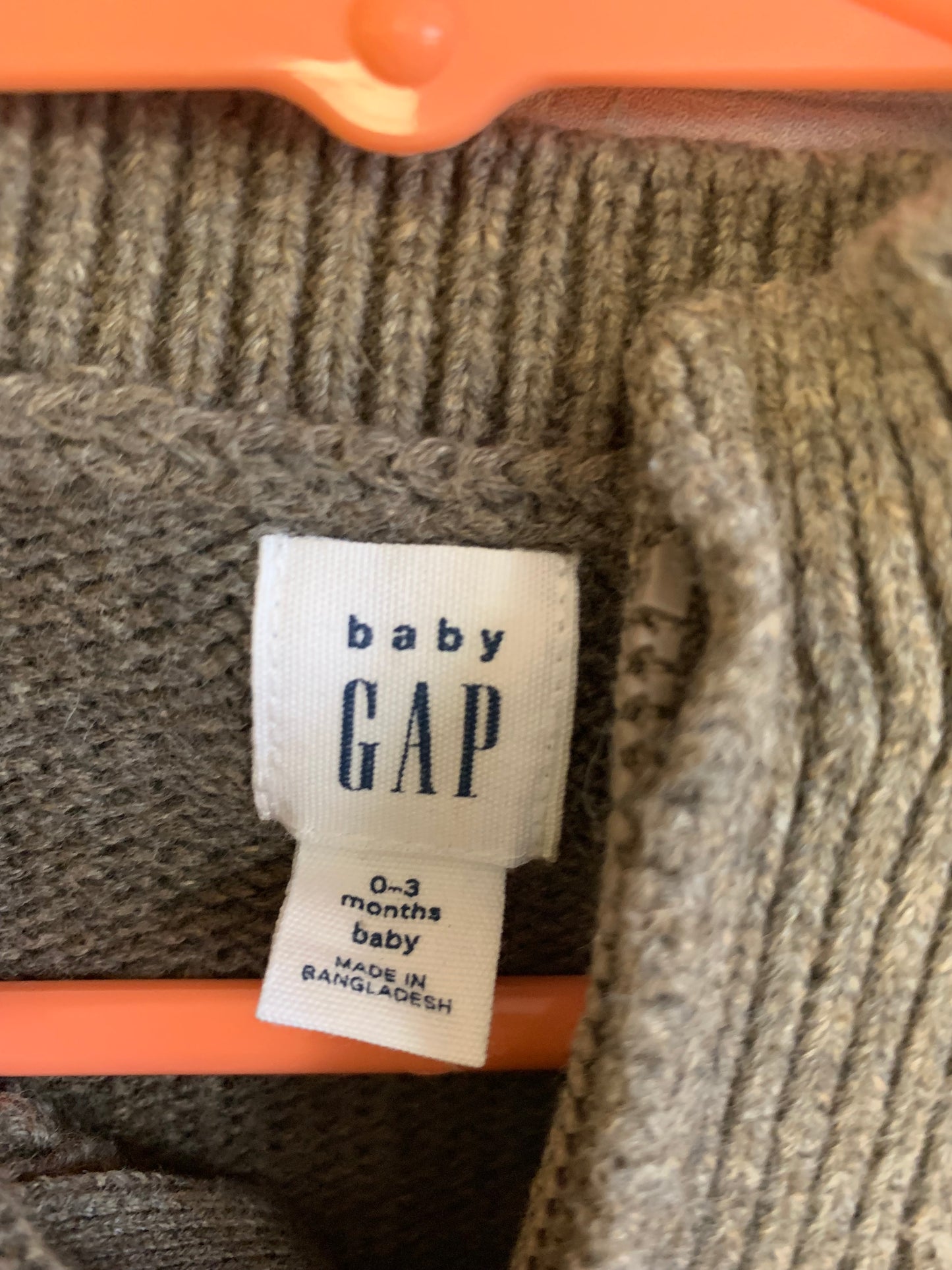 Baby Gap grey knit romper with 3/4 front zipper. Size 0-3m.