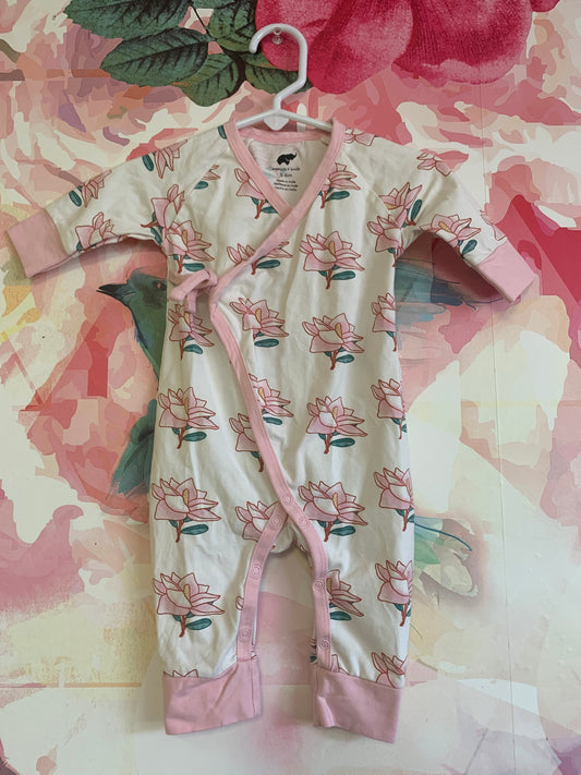 Monica & Andy cream long sleeve romper with pink flowers. Snaps & cross tie. Size 3-6m