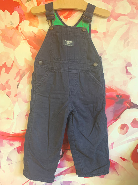 Osh Kosh navy blue overalls with green fleece lining. Size 18m