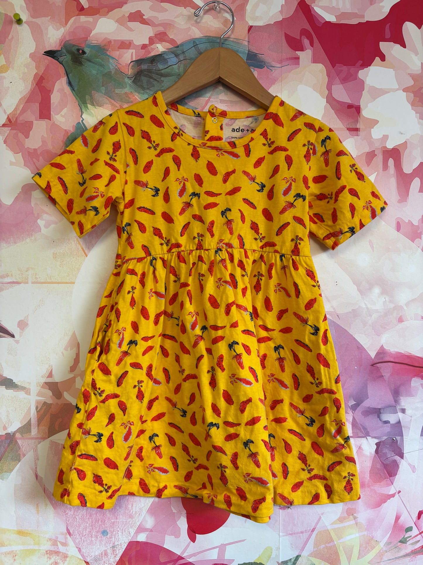 Ade & Ayo yellow short sleeve dress with red vegetables. 100% organic cotton. Size 6