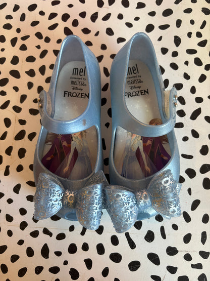 Mini Melissa Frozen shimmery blue shoes. Slight marking on one strap. See photo. Size 10.