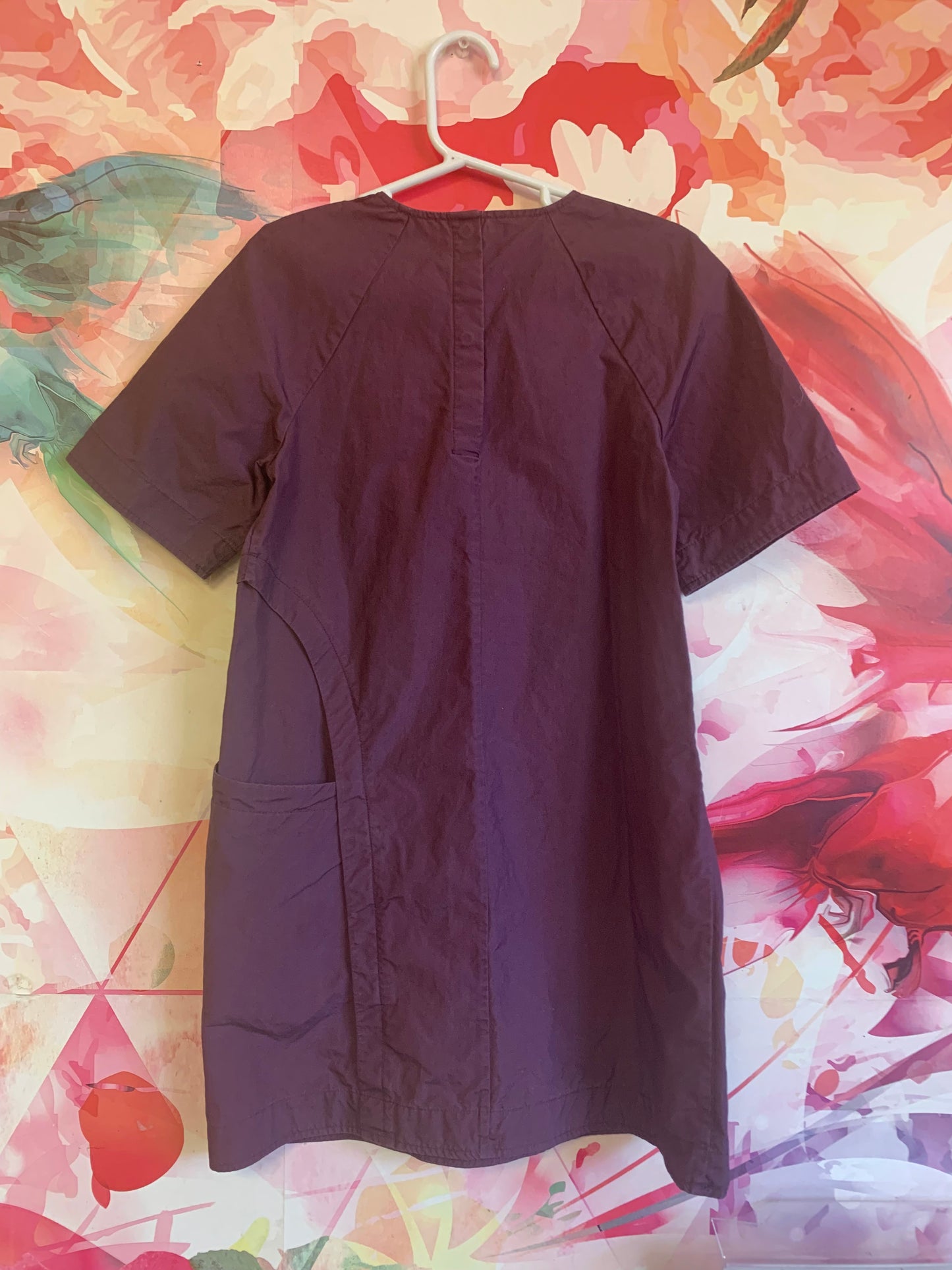 COS short sleeve purple dress with one pocket. Snap closure on back. Size 4-6T.