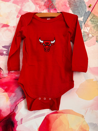 Chicago Bulls red long sleeve onesie. Size 18m. NEW WITH TAGS.
