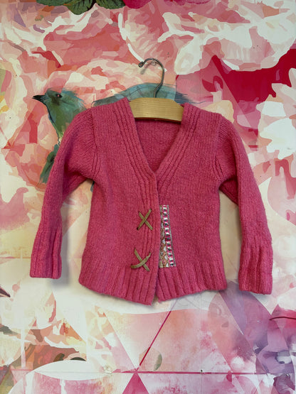 Peek pink open cardigan with gold sparkle design. Size 2/3T.