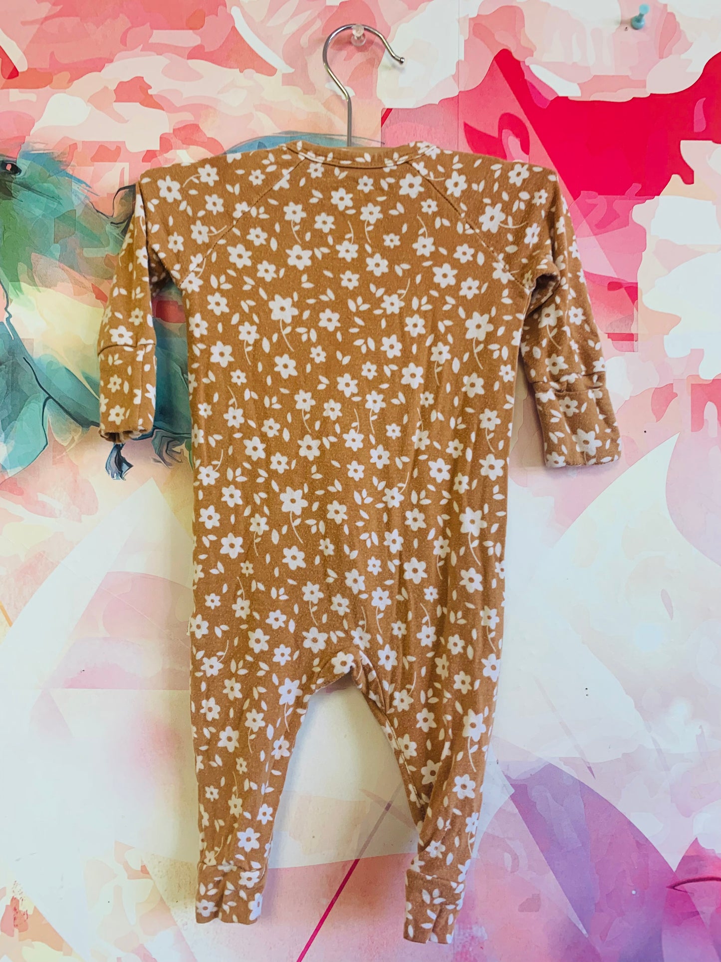 Brave Little Ones beige romper with white stars. Size 0-3m