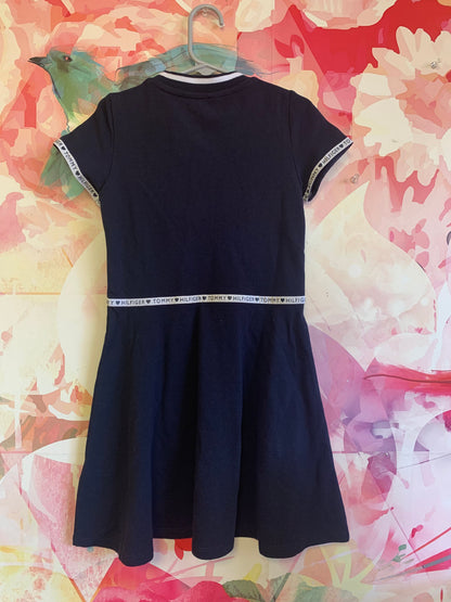 Tommy Hilfiger navy blue short sleeve dress with logo trim on sleeves & waist. Front zipper. Size 6 Tommy Hilfiger navy blue short sleeve dress with logo trim on sleeves & waist. Front zipper. Size 6