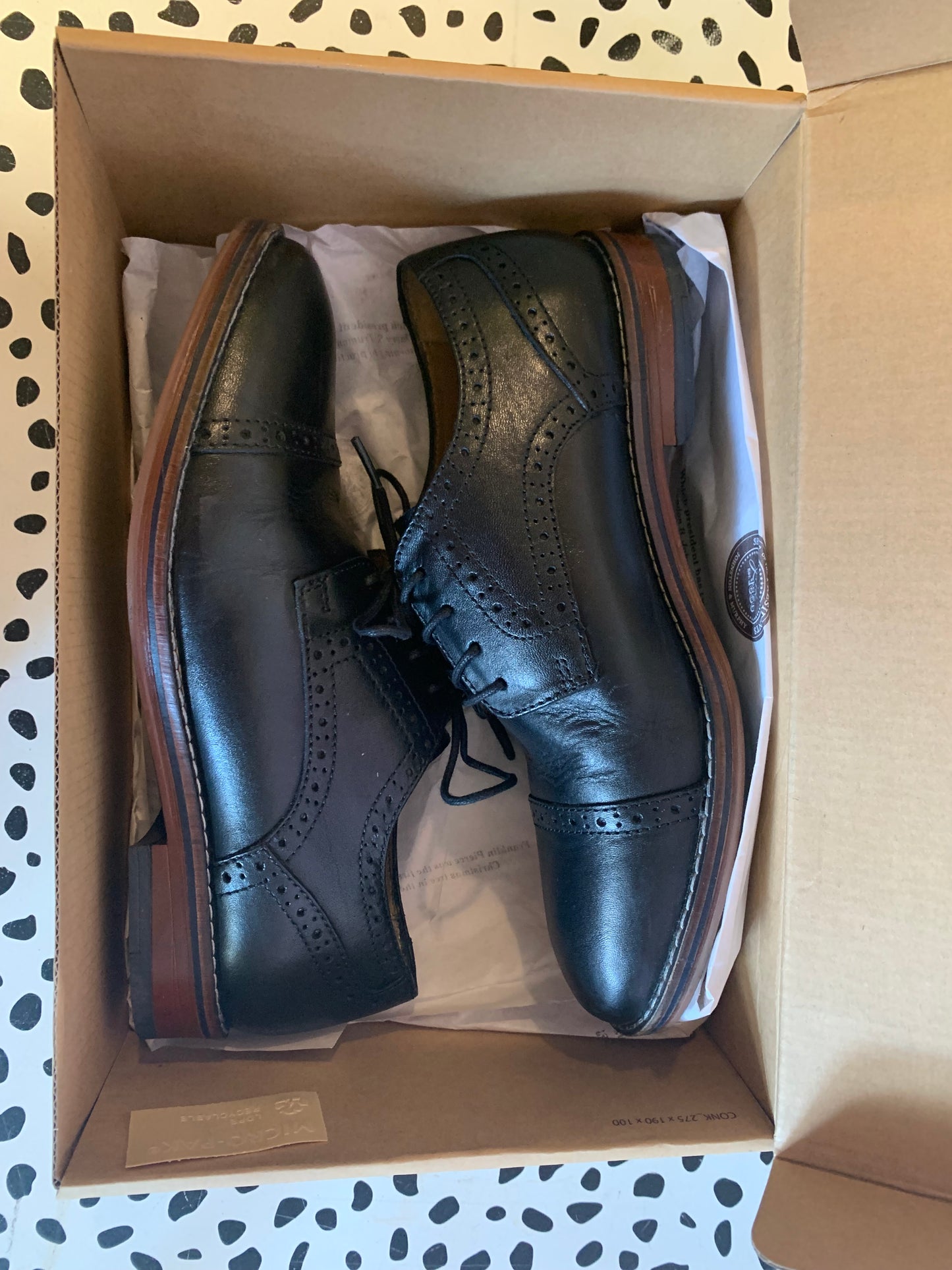 Johnston & Murphy black leather Conrad cap toe dress shoes. Size 3. Comes in original box.