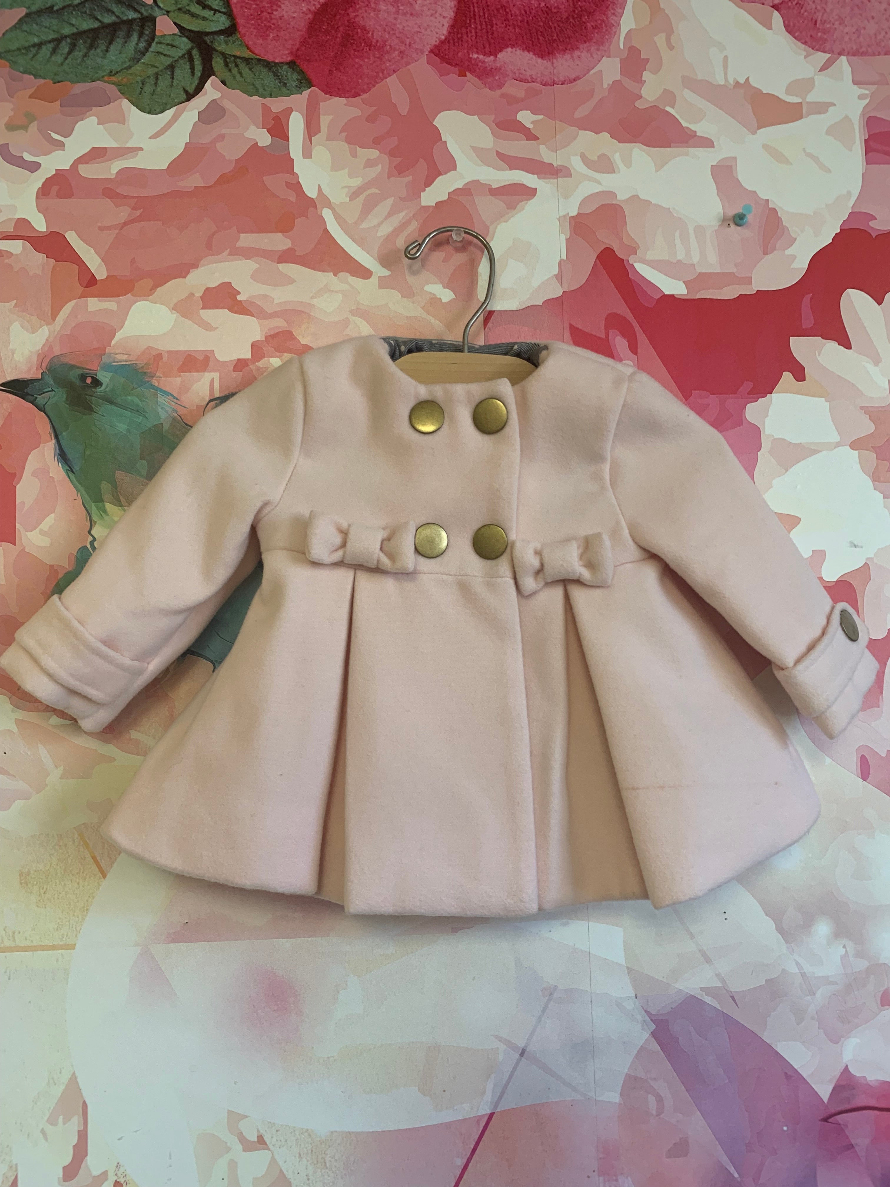Tahari light pink soft coat with two pink buttons and four gold snaps. Cloud Bunny