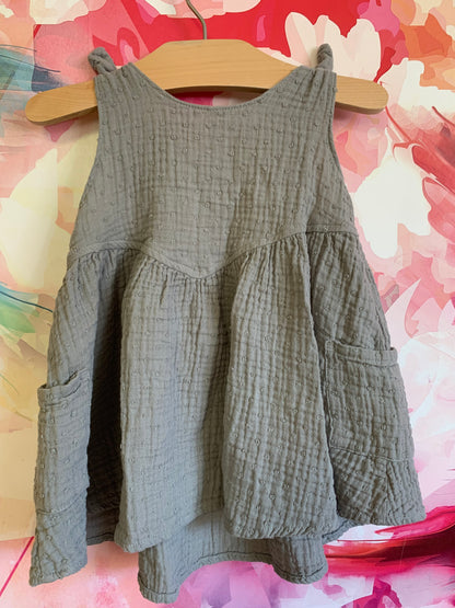 Rylee & Cru Summer dress. Sage green with fixed knot straps and side pocket details. Size 18-24m.