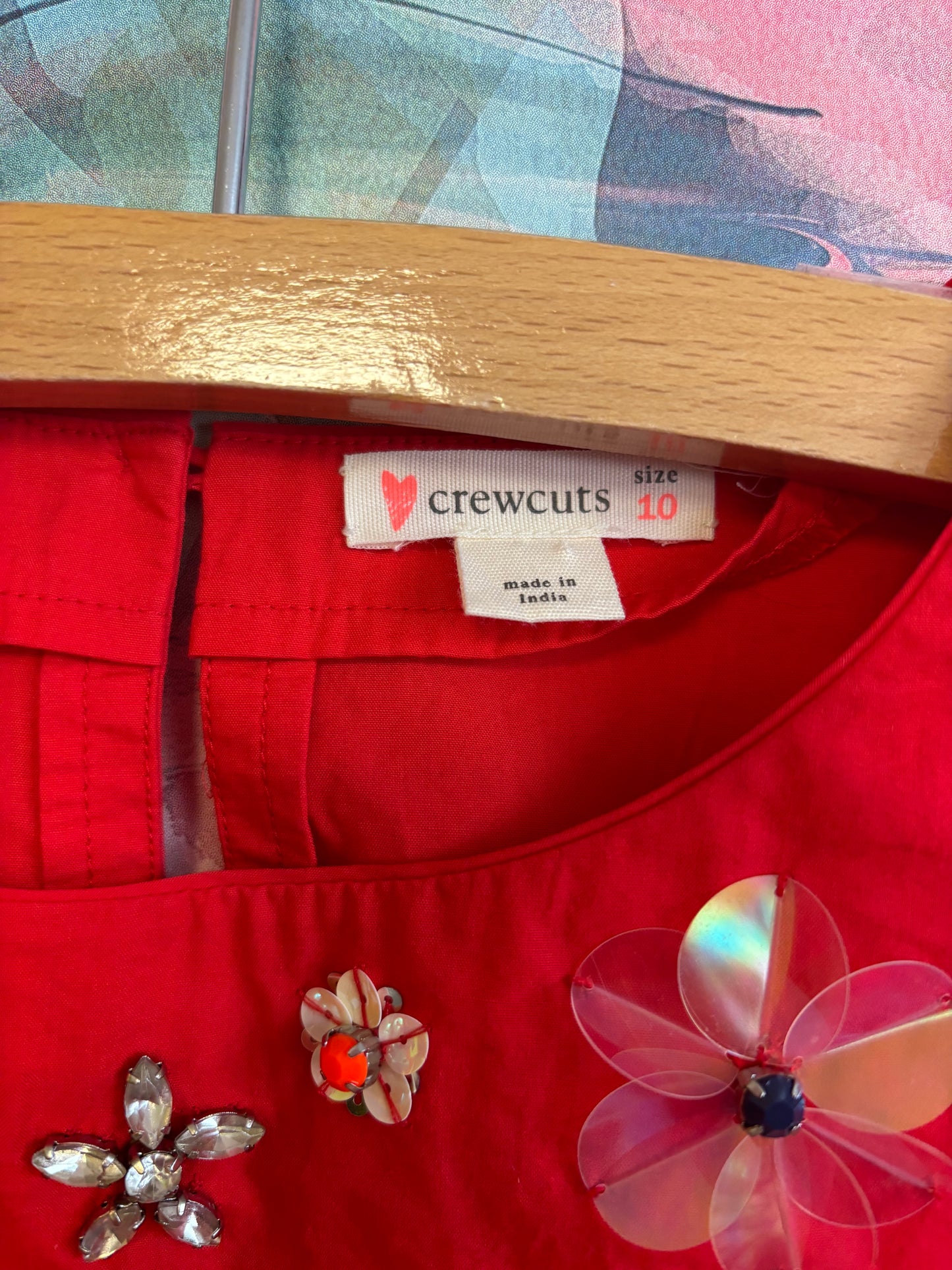 Crewcuts red short sleeve top with gemstone flowers. Size 10.