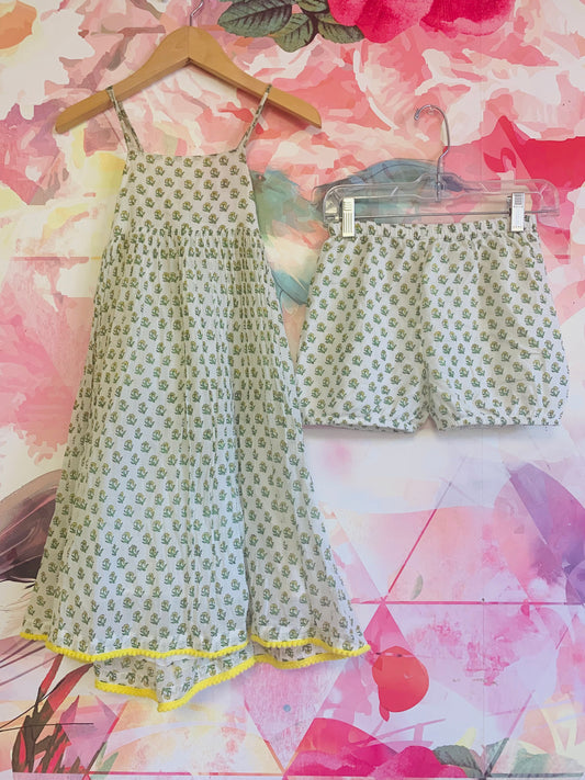 Paisley Magic two piece set. Cotton shorts and criss cross strap loose flowy dress with small yellow flowers. Size 6