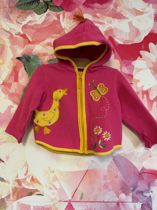 Hanna Andersson pink quilted jacket with hood. Yellow zipper & duck, butterfly, flowers. * very small stain on right sleeve visible in photo* Size 2T.