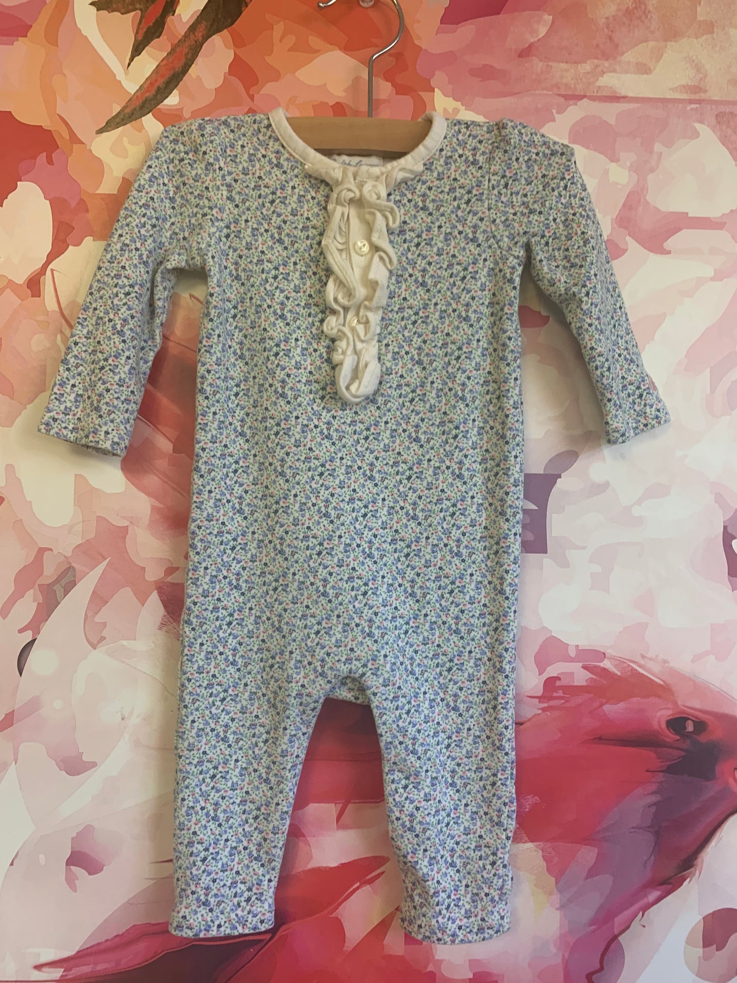 Ralph Lauren romper with blue & pink tiny flowers, buttons/ruffles on front and snap closure on legs. 6m