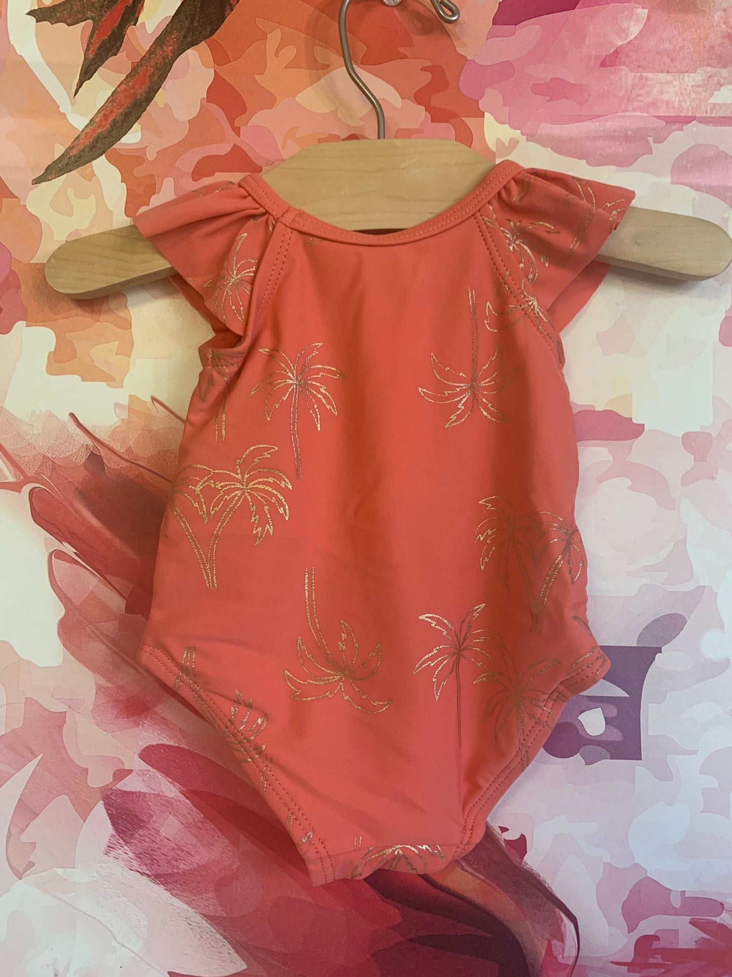 Tea Collection pink one piece swimsuit with gold palm trees. Size 3-6m