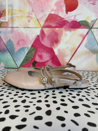 Zara pale pink dress flats with heel strap & two straps across foot. Rhinestone buckles. Size 3.