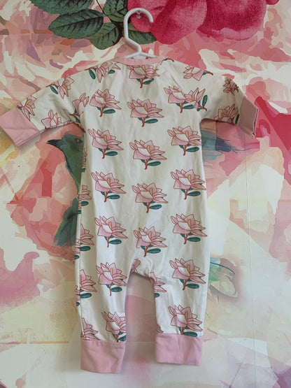 Monica & Andy cream long sleeve romper with pink flowers. Snaps & cross tie. Size 3-6m