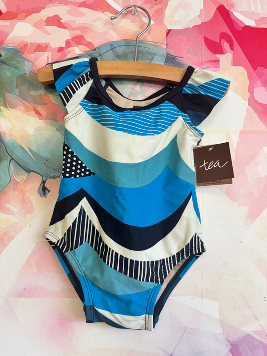 Tea Collection one piece swimsuit. Blue, cream, black. Size 6-9m. NEW WITH TAGS.