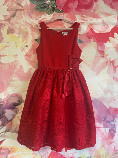 Emily West red sleeveless party dress. Shimmery top, tulle and lace skirt with red waist bow & jewels. Tie and zipper back. Size 8