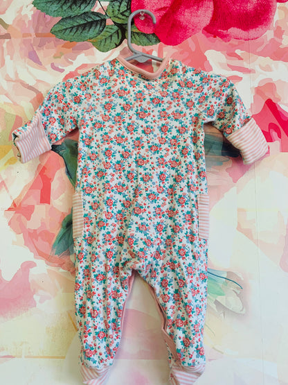 Baby Boden red, pink, green floral long sleeve footed romper with snaps. Pink/white stripes on pockets & wrists. Size 0-3m