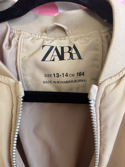 Zara beige crop bomber jacket with zipper pockets on sleeves. Size 13/14