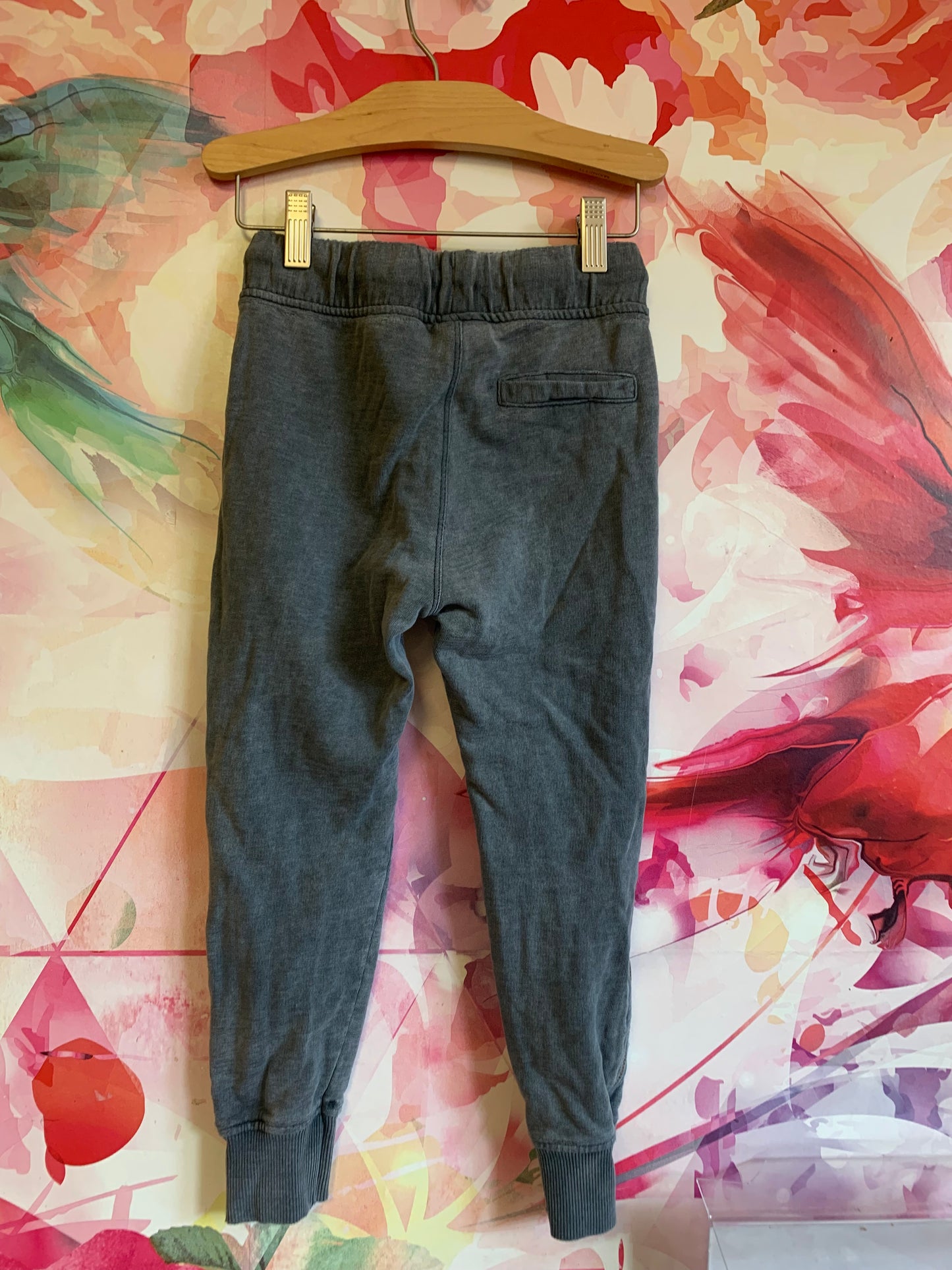 Zara grey joggers with calf zippers. Right pocket says NEVER EVER ON TIME. size 6.