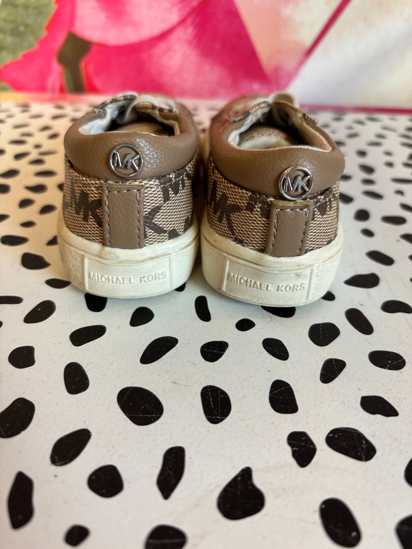 Michael Kors tan & cream slip on logo sneakers. Size 5.