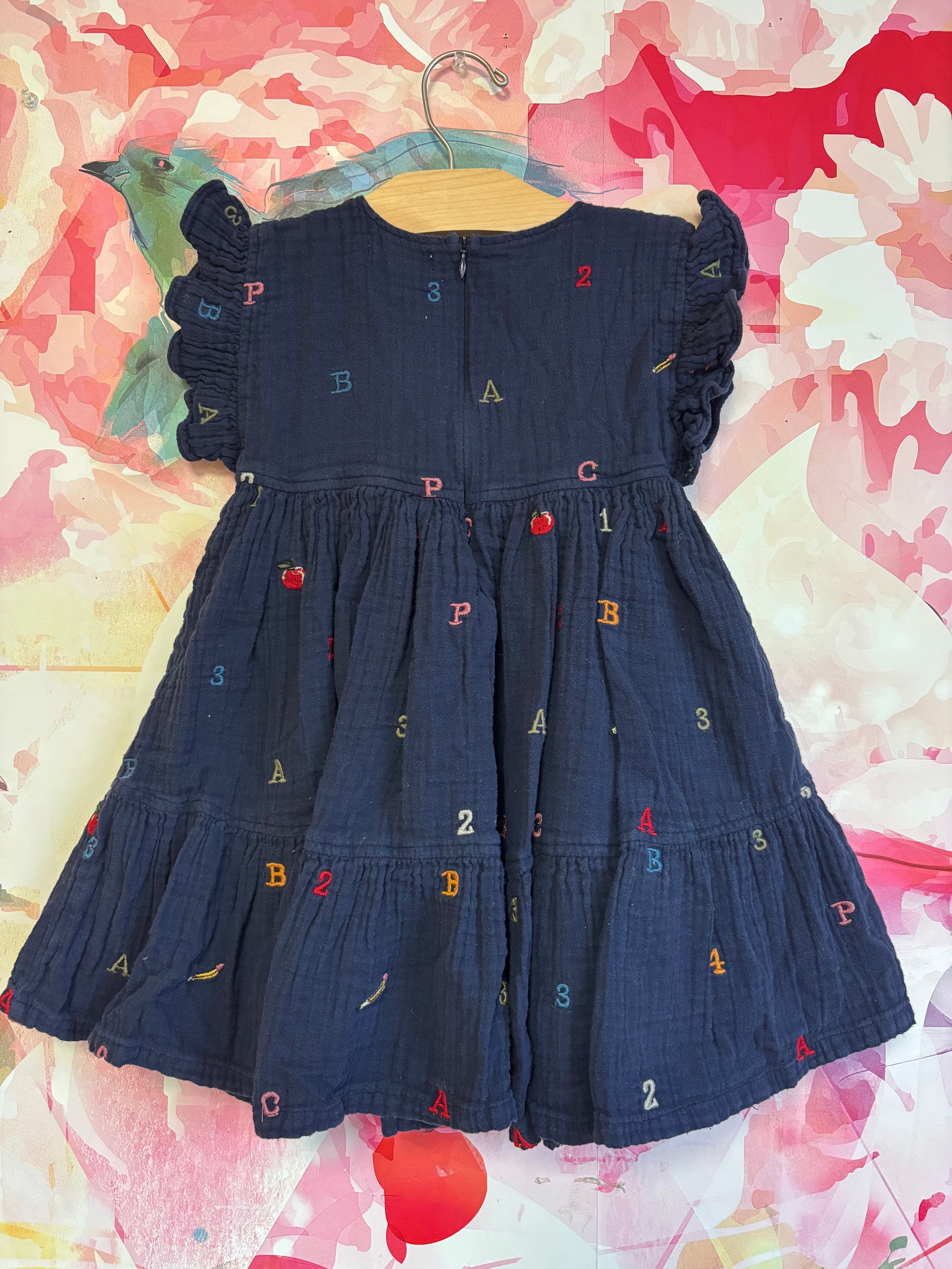 Pink Chicken girls kit dress - alphabet embroidery. Navy blue short sleeve dress with numbers & letters. Size 4T Pink Chicken girls kit dress - alphabet embroidery. Navy blue short sleeve dress with numbers & letters. Size 4T