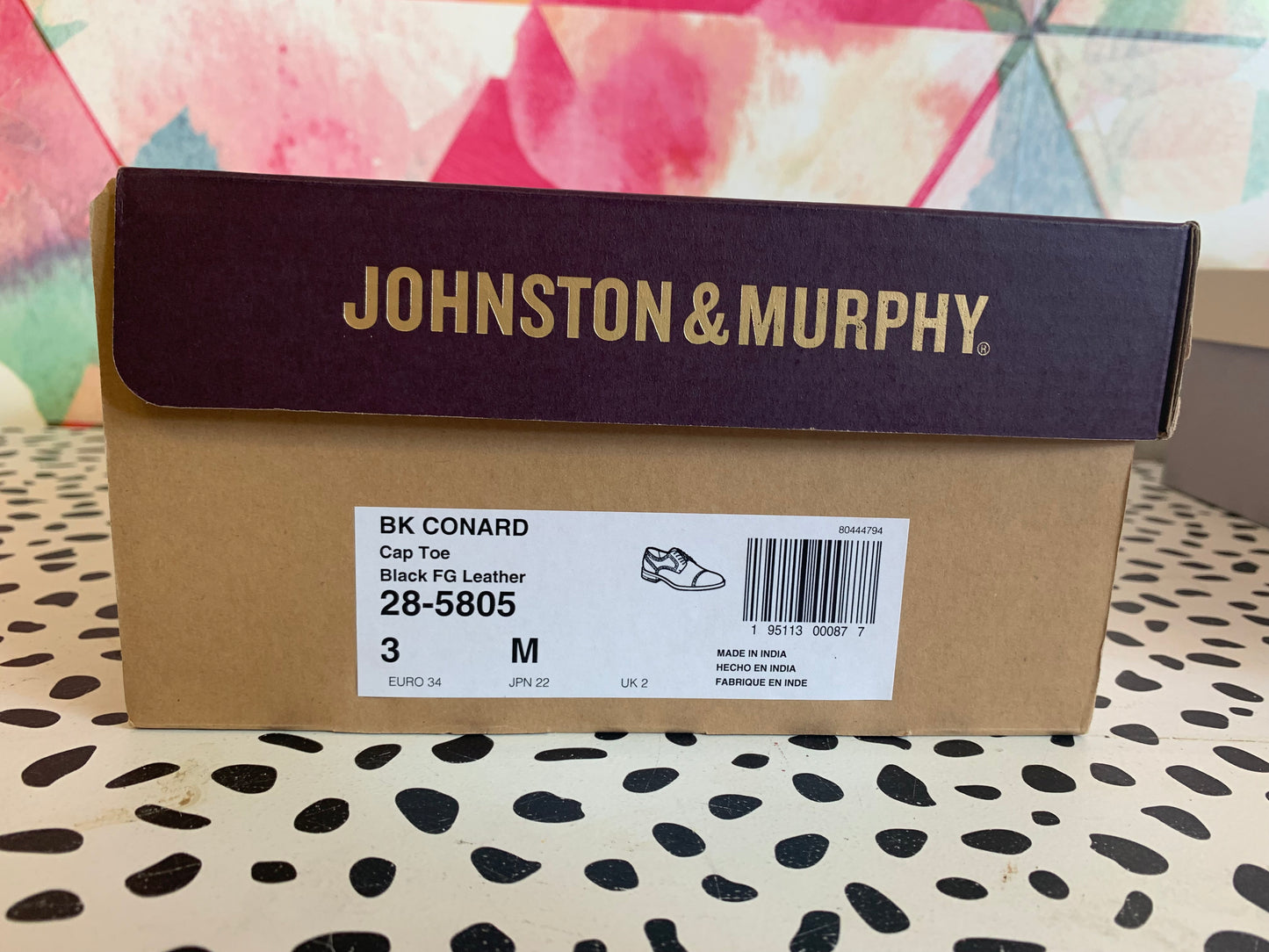 Johnston & Murphy black leather Conrad cap toe dress shoes. Size 3. Comes in original box.