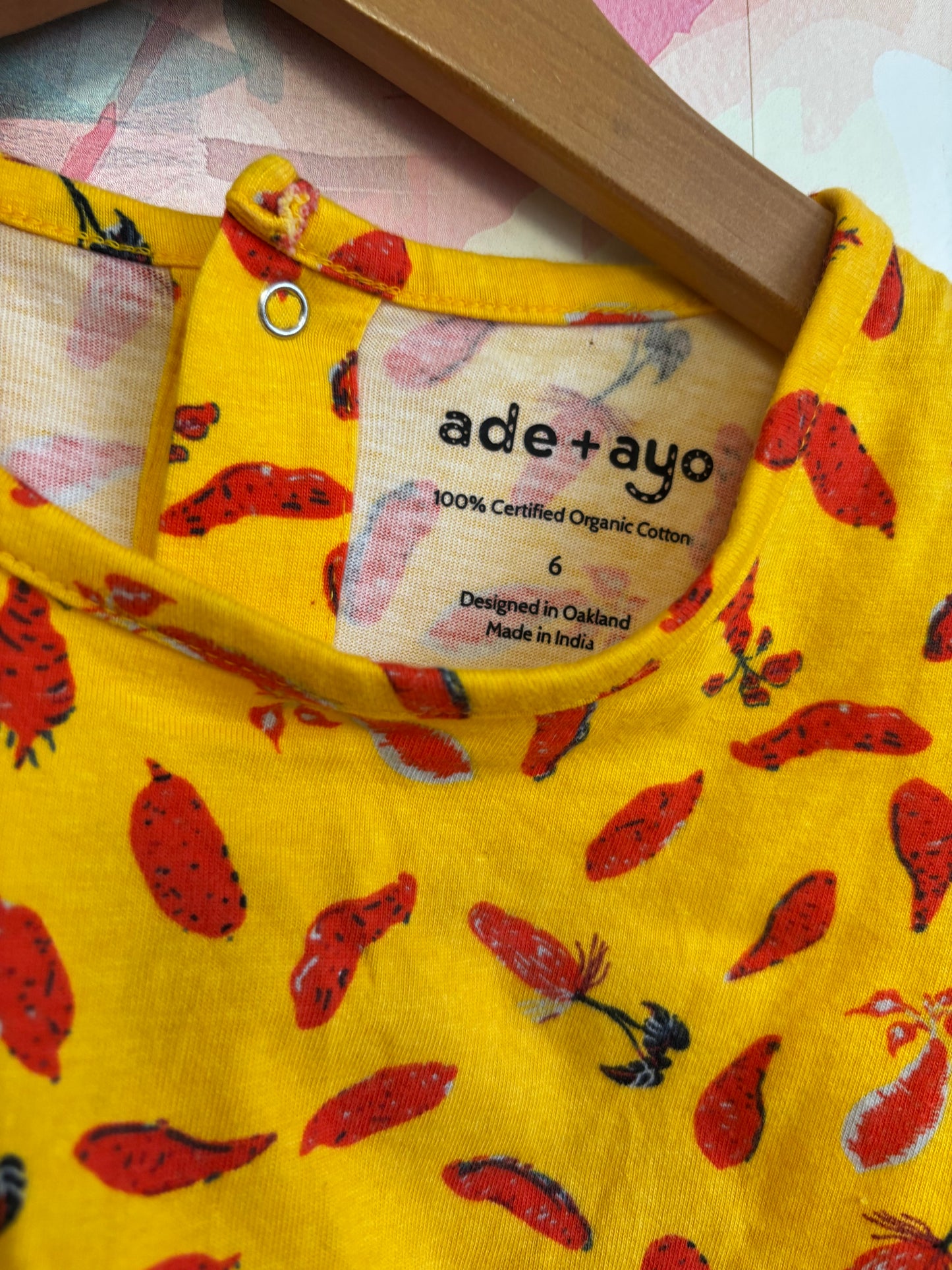 Ade & Ayo yellow short sleeve dress with red vegetables. 100% organic cotton. Size 6