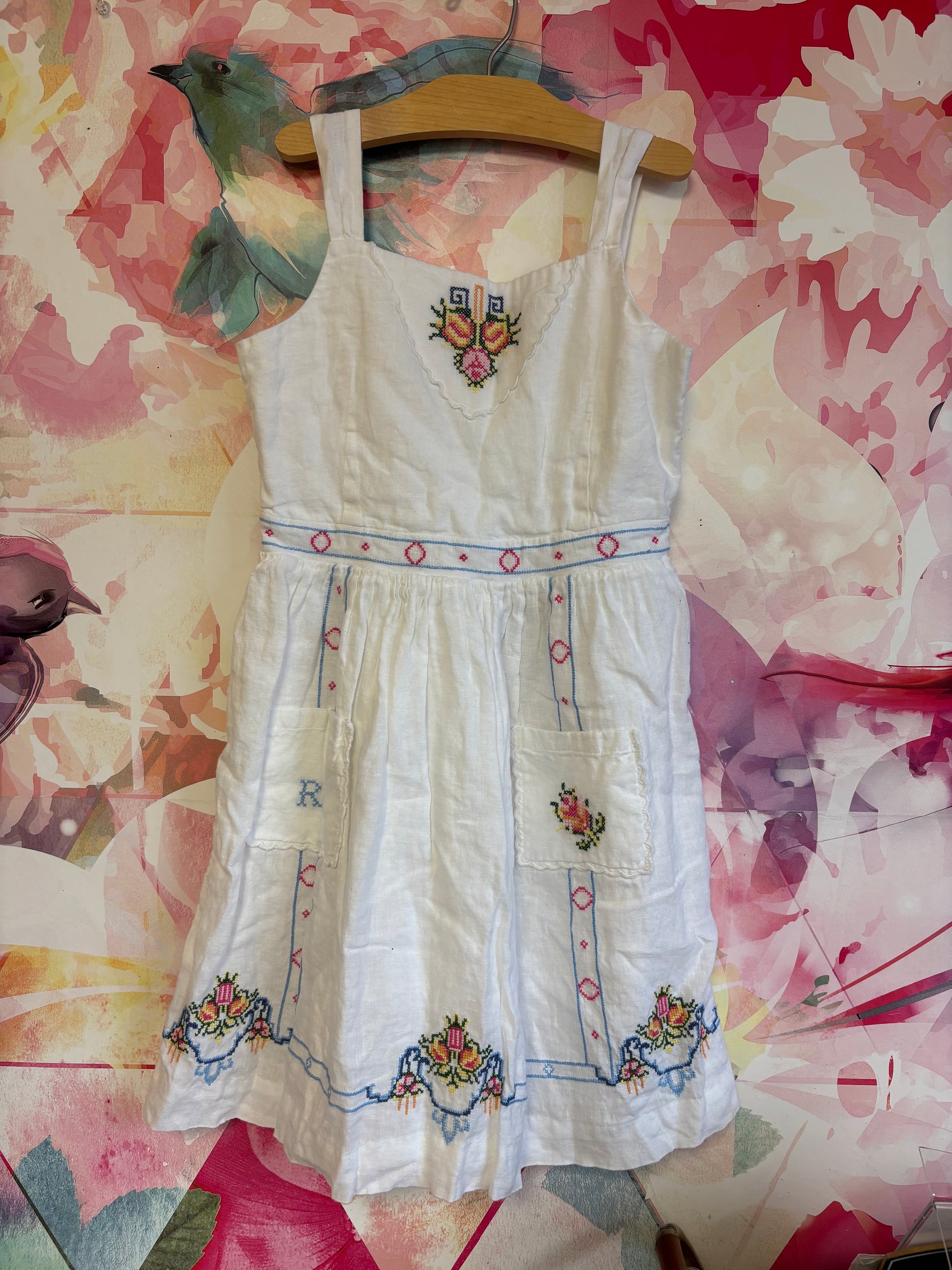 Ralph Lauren Polo Country White linen dress with pink, blue, yellow, green embroidery. Front pockets and buttons on back. Size 12. Ralph Lauren Polo Country White linen dress with pink, blue, yellow, green embroidery. Front pockets and buttons on back. Size 12.