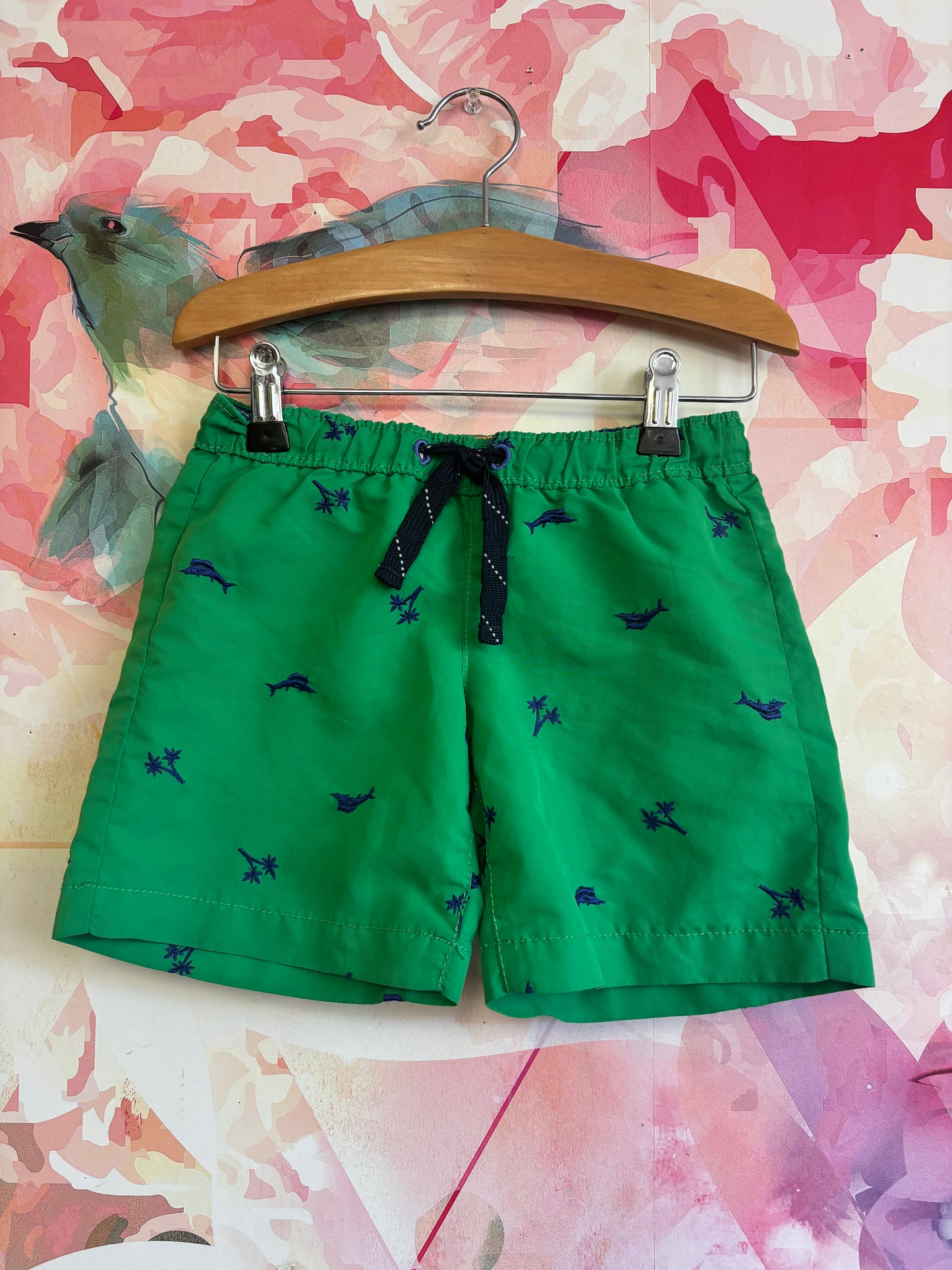 Tommy Bahama green swim trunks with blue palm trees. Size 3T