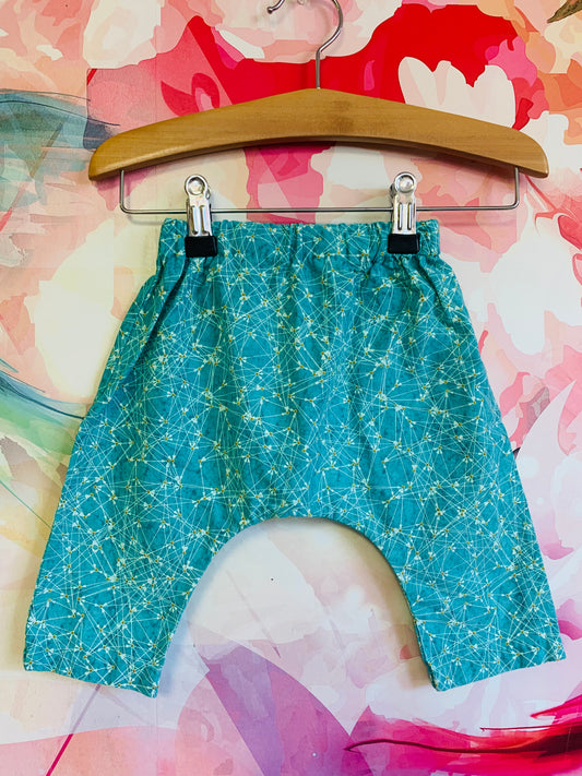 Teal balloon pants with white & gold details. Elastic waist. Size 2/3T.