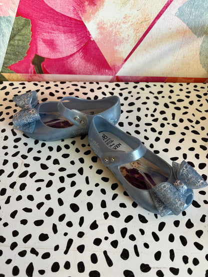 Mini Melissa Frozen shimmery blue shoes. Slight marking on one strap. See photo. Size 10.