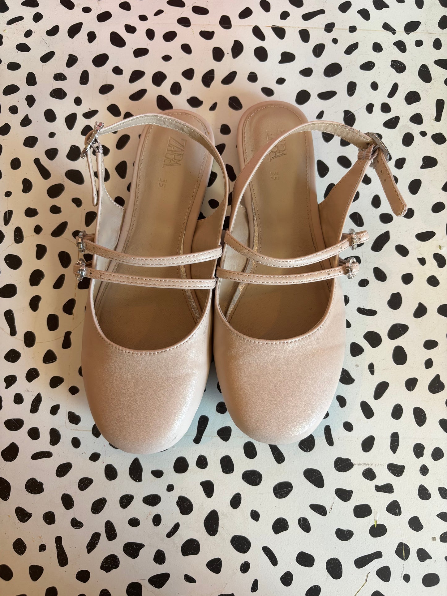 Zara pale pink dress flats with heel strap & two straps across foot. Rhinestone buckles. Size 3.