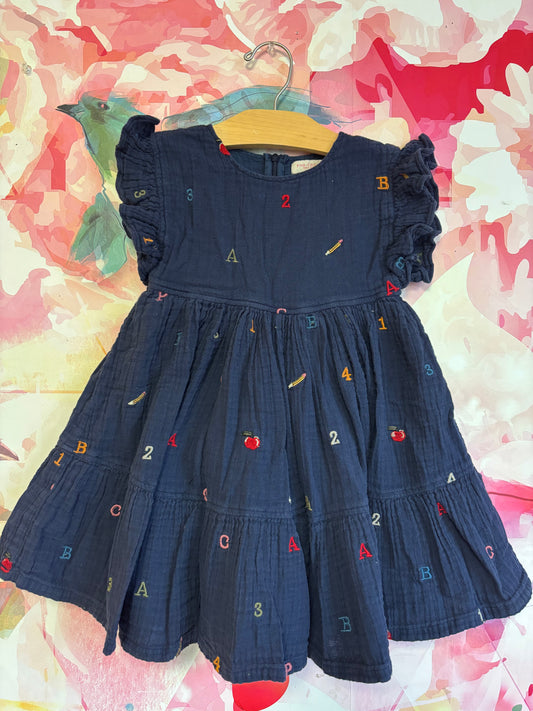 Pink Chicken girls kit dress - alphabet embroidery. Navy blue short sleeve dress with numbers & letters. Size 4T