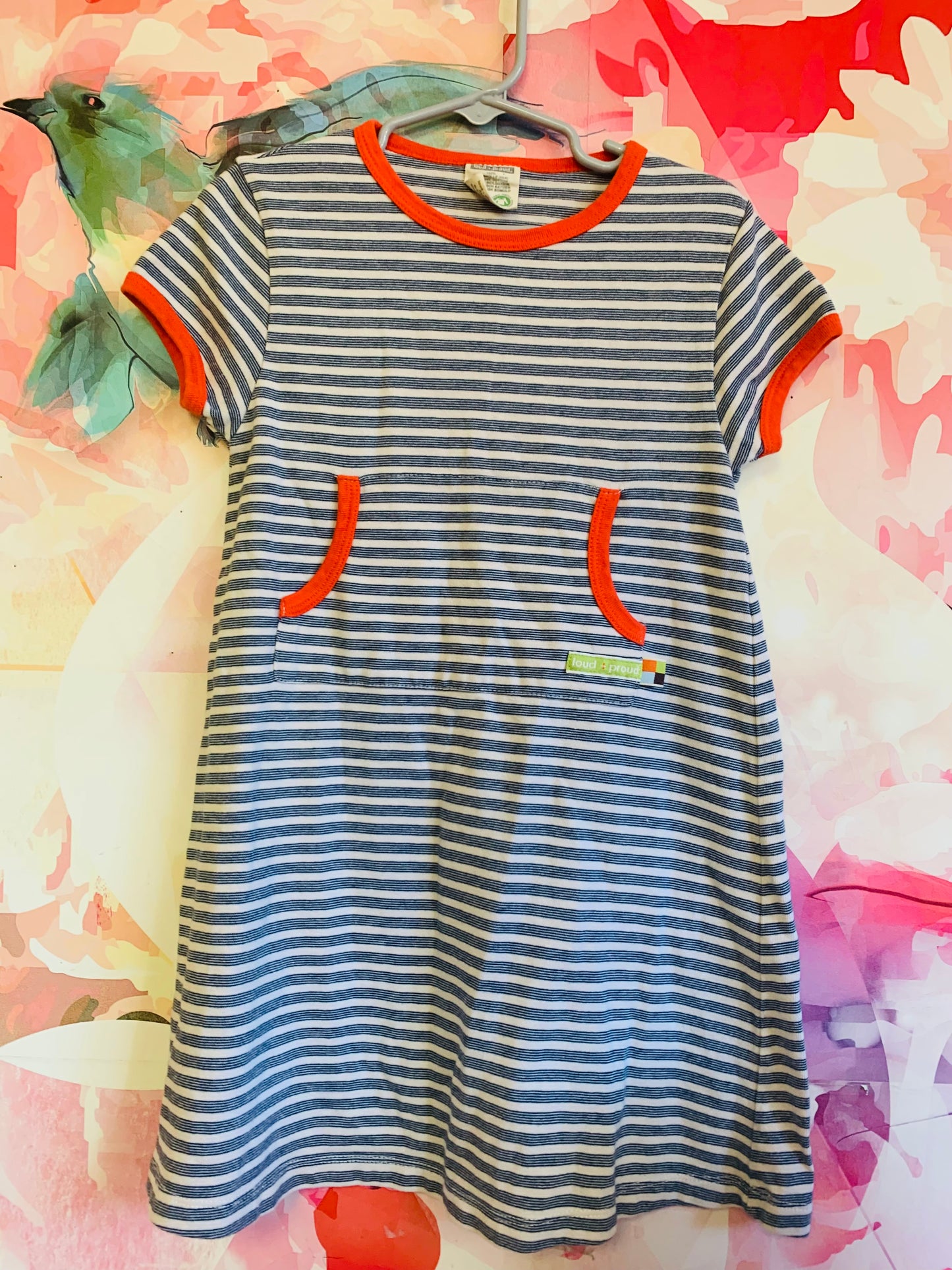 loud + proud 100% organic cotton short sleeve blue & white striped dress. Orange trim and front kangaroo pocket. Size 5T