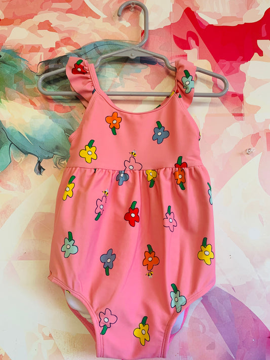 Hanna Andersson pink one piece swimsuit with colorful flowers. Size 2T.