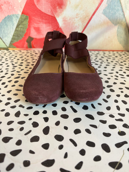 Elephantito purple suede leather Melissa flats. Luxe comfort ballerina shoe that features crossed stretch ankle straps for a secure fit. Lightly padded footbed leather outsole & lining. Size 3.