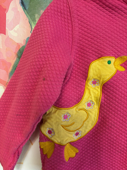 Hanna Andersson pink quilted jacket with hood. Yellow zipper & duck, butterfly, flowers. * very small stain on right sleeve visible in photo* Size 2T.